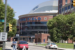 Tom waiting in the forground of Ford Field