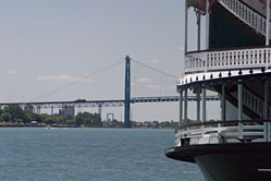 Detroit Princess docked in the Michigan River with the Ambassador Bridge to Windsor, Ontartio in the background